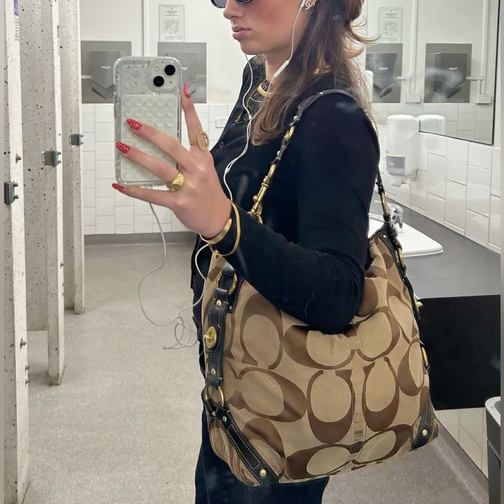 Authentic Coach purse in brown with gold-tone.